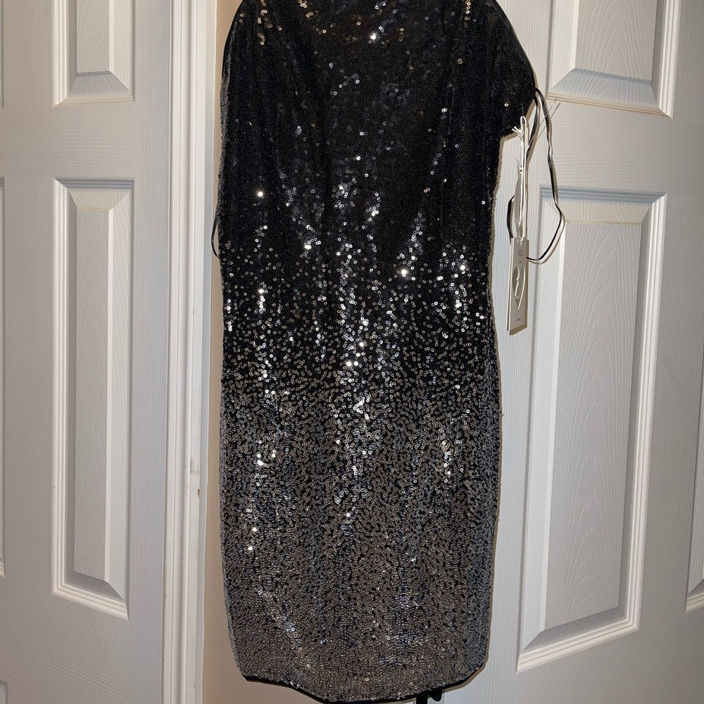 Black and silver sequins dress size small.